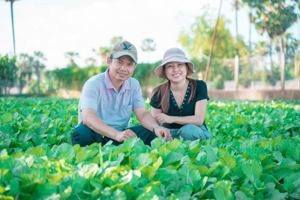 The owner of Asa Mart is at the vegetable farm