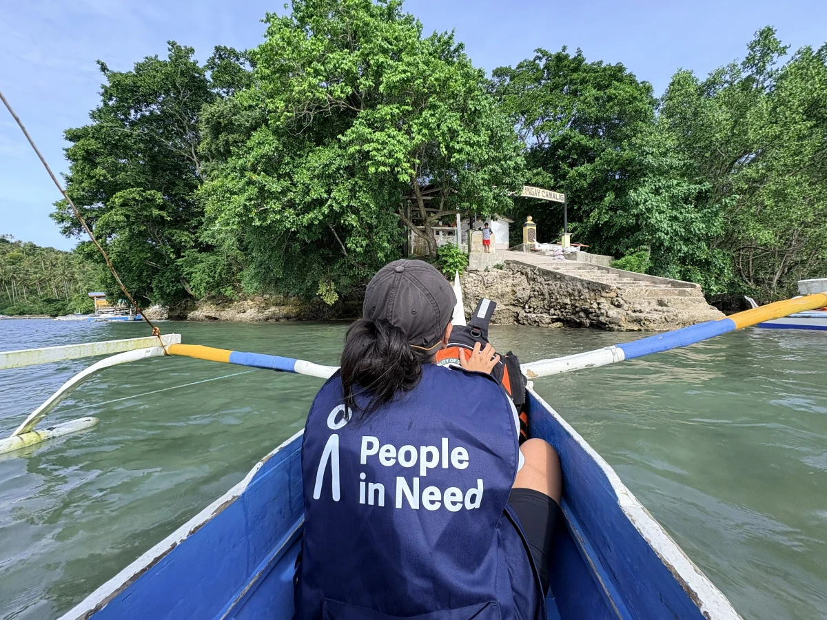 Czarina Jezza Dammo, Education in Emergencies Project manager travel by boat to Sarangani Island to deliver emergency assistance to communities affected by the June 8 earthquake.